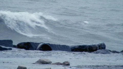 Dark Waves Crashing on Rocks Stock Footage 111271