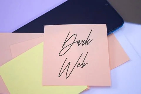 Dark Web. Text on adhesive note paper. Event, celebration reminder message. Stock Photos