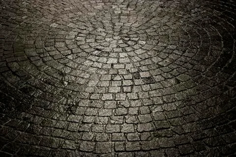 Dark wet cobblestone background Foto stock