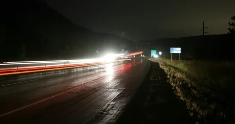 Dark winding wet freeway - 4K time lapse Stock Footage 96447009