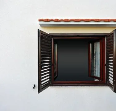Dark window on white wall Stock-Fotos