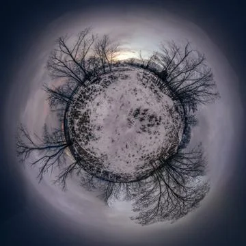 Dark winter planet with trees and sunset, 360 degree photo spherical projection Stock Photos