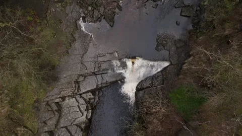 Dark wintery waterfall overhead flight rapid elevation Stock-Footage 262083370