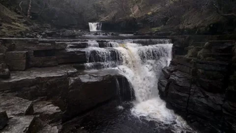 Dark wintery waterfall slow orbit Stock-Footage 262083488