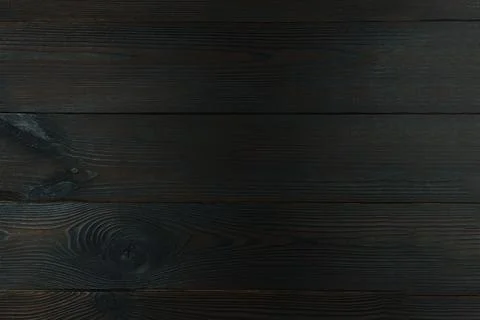 Dark wooden background.The texture of the tree. Background, texture. Stock Photos