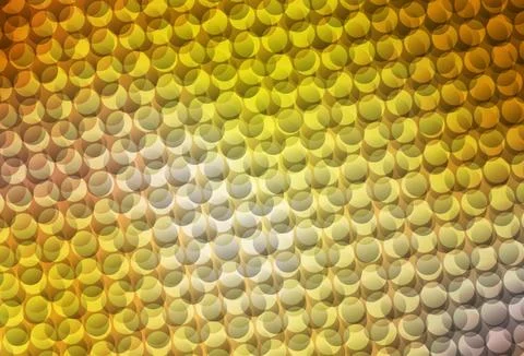 Dark Yellow vector backdrop with dots. Stock Illustration