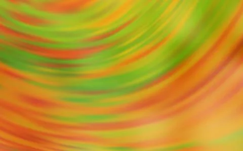 Dark Yellow vector blurred and colored pattern. An elegant bright illustratio Illustrazione stock