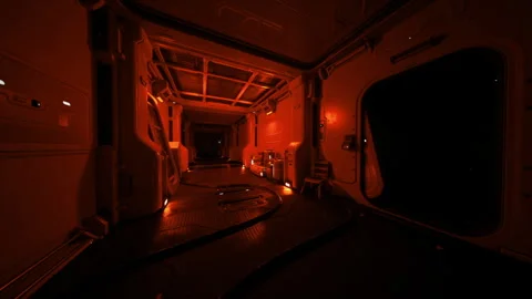 Darkened passageway faintly lit by red signals and visible safety equipment Stock Footage 339629397