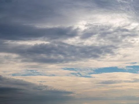 Darker and lighter clouds with some blue in the middle Stock Photos
