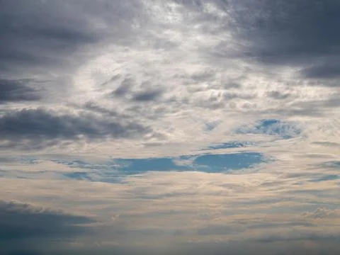 Darker and lighter clouds with some blue in the middle Foto stock