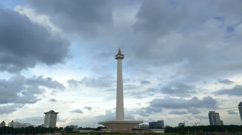 Darker cumulus clouds fly over National Monument, time-lapse shot Stock Footage 51380817