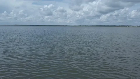Darker Sky and Clouds Over the River in Charleston, SC while Moving Stockbeeldmateriaal 207818093
