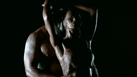 In the darkness on a black background, a stunning scene of passion and devotion Stock-Footage 274727202
