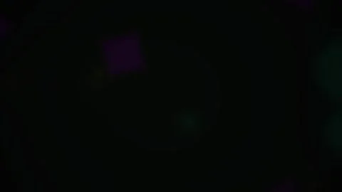 Darkness with colorful pixelated spots. Stock Footage 334185849