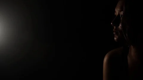 The darkness surrounding her Stock Footage 122357265