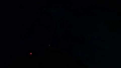 Darknight with some spot light on the top of building Stock Footage 143789267