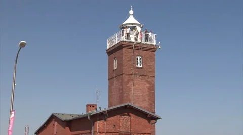 Darlowo lighthouse seen from a passing ship 2 Stock Footage 52996372