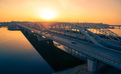 Darnitskiy bridge at sunset Stock Photos