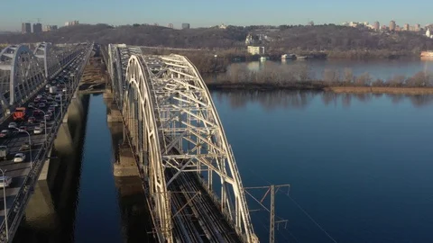 Darnitsky bridge over the Dnieper River. Ukraine city Kiev. 스톡 동영상 128229241
