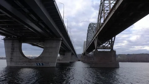 Darnitsky bridge over the Dnieper River. Ukraine city Kiev. Stock Footage 128229817