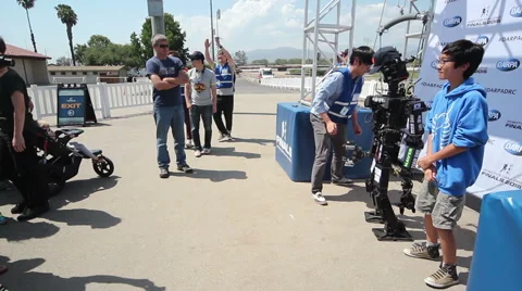 DARPA Robotics Challenge Team SNU Posing with People Stock Footage 54988733