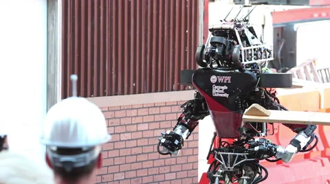 DARPA Robotics Challenge Team WPI-CMU Warner Atlas Robot Folding Arm Stock Footage 55058205