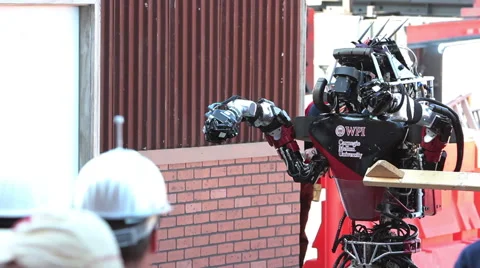 DARPA Robotics Challenge Team WPI-CMU Warner Atlas Robot Walking Stock Footage 55058642
