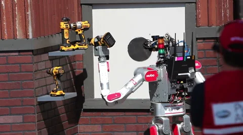 DARPA Robotics Challenge UNLV DRC-Hubo Turns to Cut a Wall Video stock 54986334