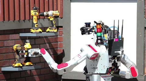DARPA Robotics Challenge UNLV DRC-Hubo Grabs a Cutting Tool Stock Footage 54990294
