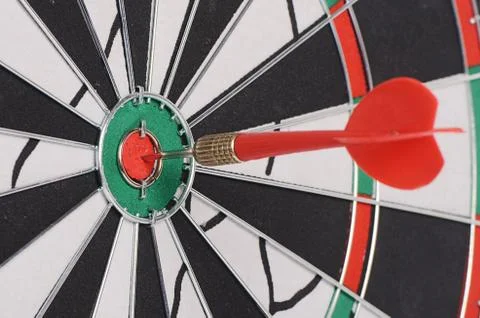 A dart on dartboard Stock Photos