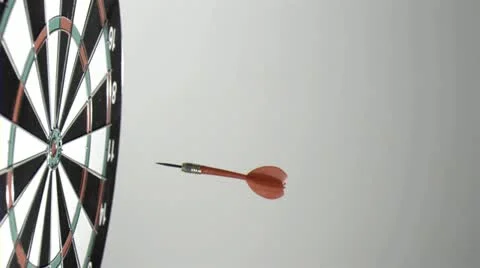 Dart going in the bullseye Stock Footage 12890930