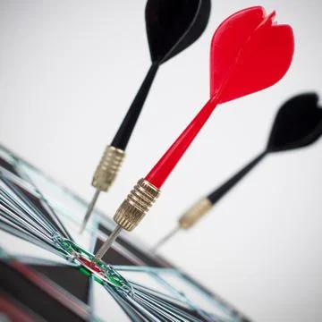 Dart hit the dead centre of target Stock Photos