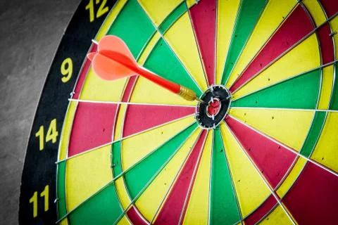 Dart hitting a target Stock Photos