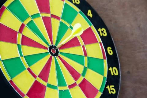 Dart hitting a target Stock Photos