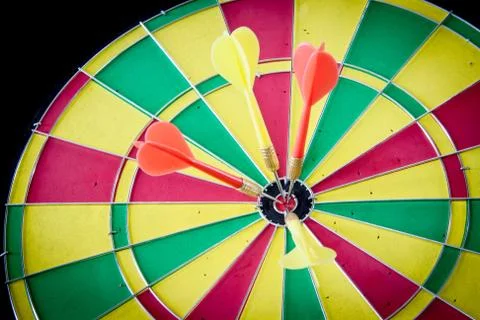 Dart hitting a target Stock Photos