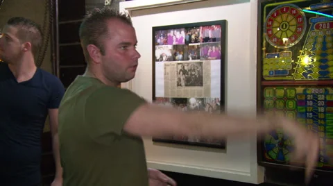 Dart pub The Entertainer where Raymond van Barneveld started his career Stock Footage 59136183