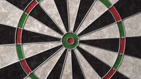 The dartboard quickly rotates 360 degrees. Close up. Stock Footage 237873484
