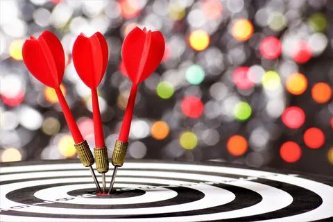 A dartboard target. Regular accurate hitting of the target. Stock Photos