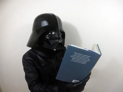 Darth Vader does things - Star Wars character Stock-Fotos