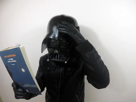 Darth Vader does things - Star Wars character Stock-Fotos