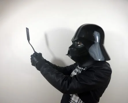 Darth Vader does things - Star Wars character Stock-Fotos