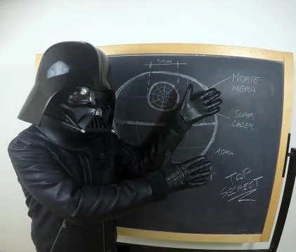 Darth Vader does things - Star Wars character Stock-Fotos