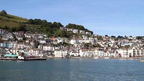 Dartmouth, Devon: Paddlesteamer sequence sailing past the Royal Naval College Stock Footage 114623128