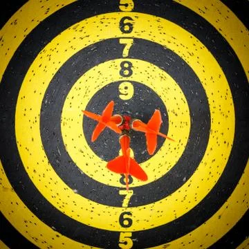 Darts arrows in the target Stock Photos