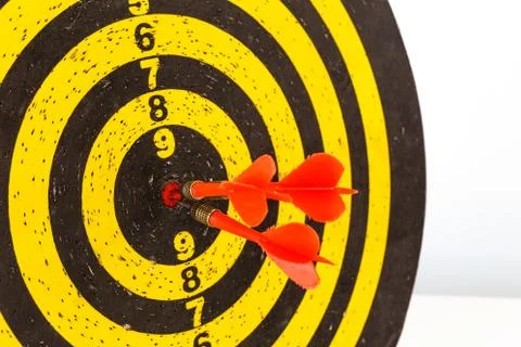 Darts arrows in the target Stock Photos