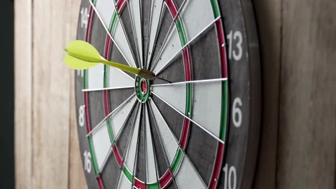 Darts game. Throwing darts at the target Stock Footage 149144567