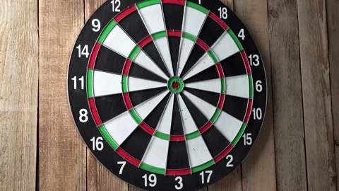 Darts game. Throwing darts at the target Stock Footage 149144737