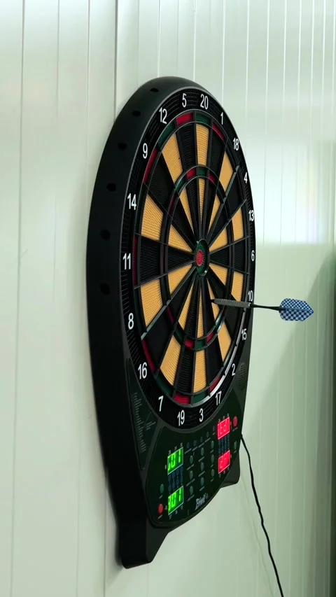Darts hitting dartboard in close up Stock Footage 335882763