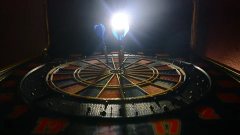 Darts hitting target, darts hitting the red center of the target 動画素材 102525672