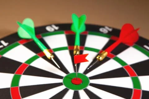Darts with the target . Stock Photos
